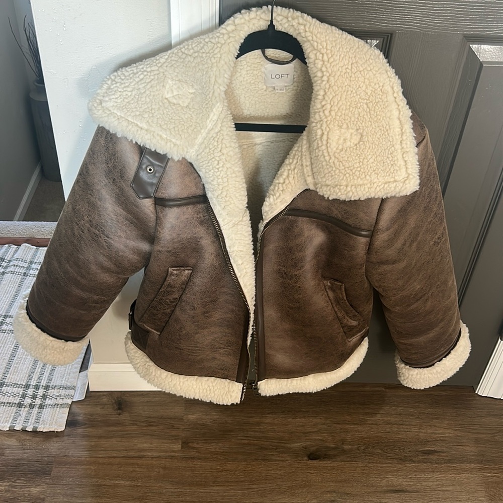 Crackled Leather aviator Loft jacket. .  Brown with fur trim.  Worn once